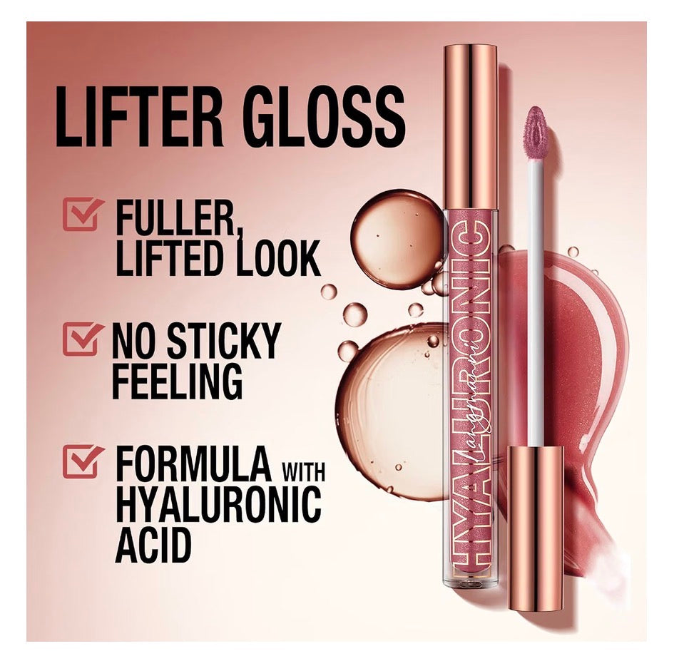 Close-up of a lip gloss tube and applicator tip